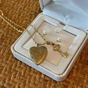 Heart shaped locket with key charm and pearl/diamond earrings